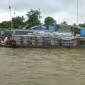 Cai Be.Floating Market with Products on Sticks