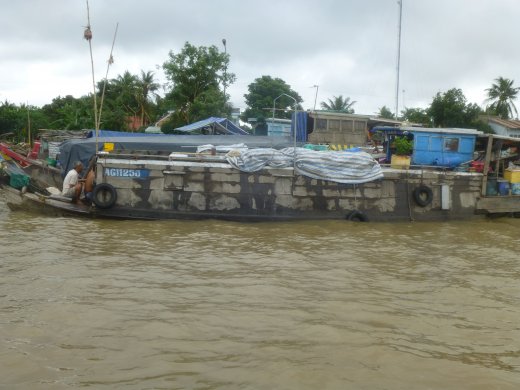 Cai Be.Floating Market with Products on Sticks